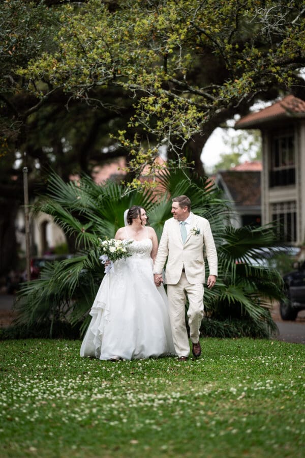 Couple walking through Jack Bartlett park