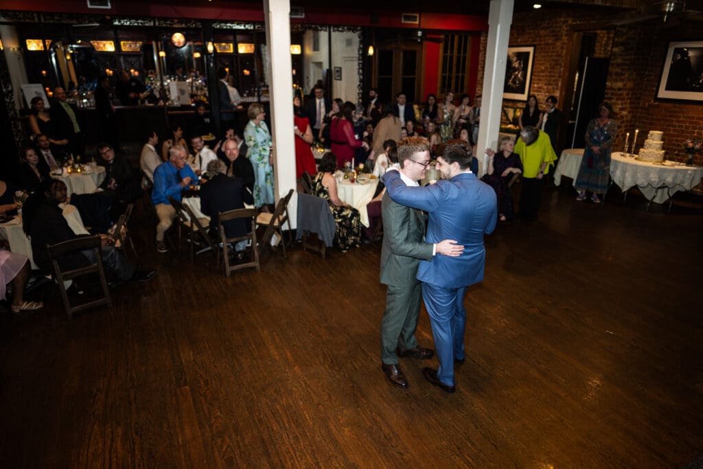 Grooms have their first dance