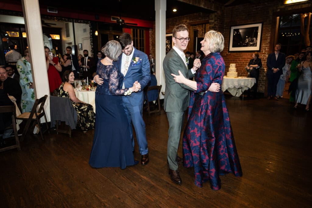 Grooms dance with mothers