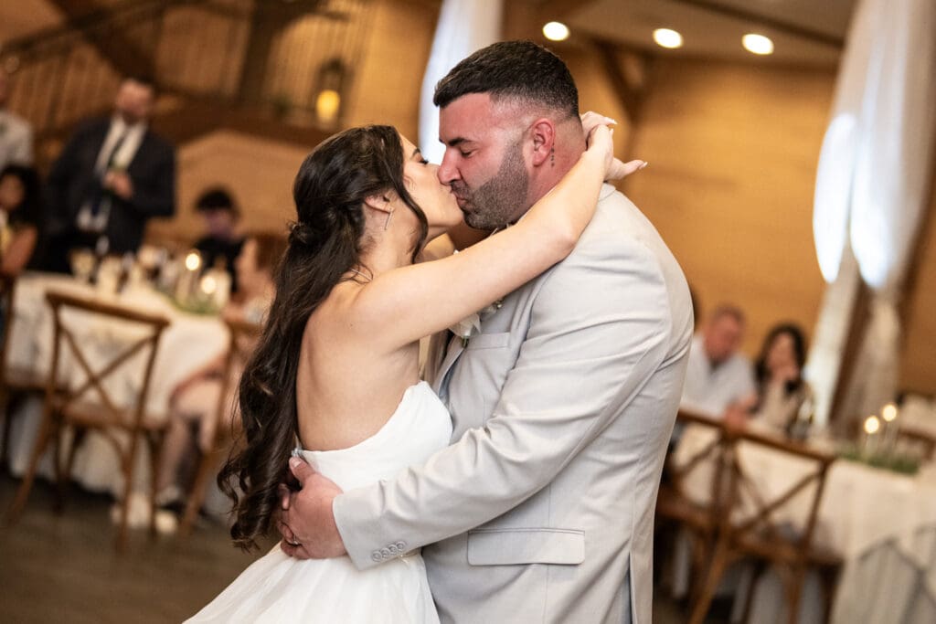 Bride and groom kissing