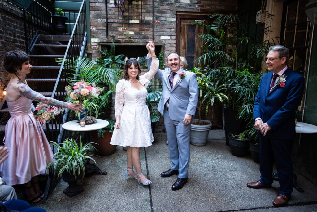 Bride and groom celebrate at end of ceremony