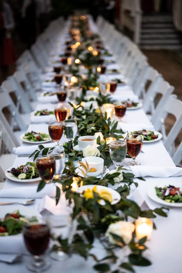 Table is set for seated dinner at Degas House