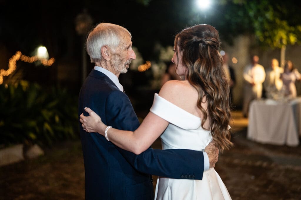 Bride and grandfather dance