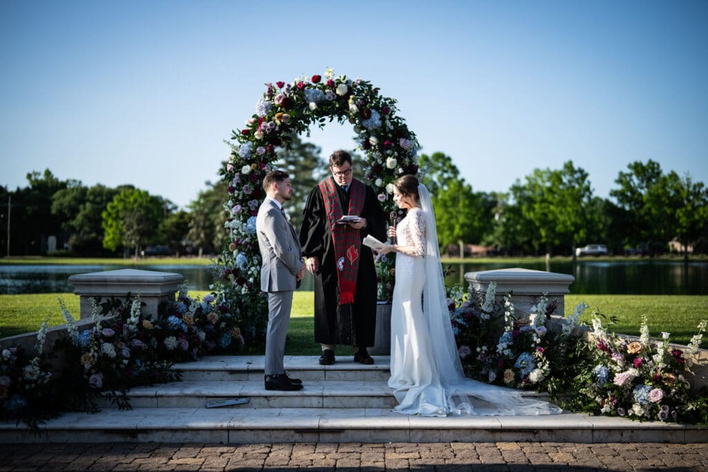 Bride and groom read vows to each other