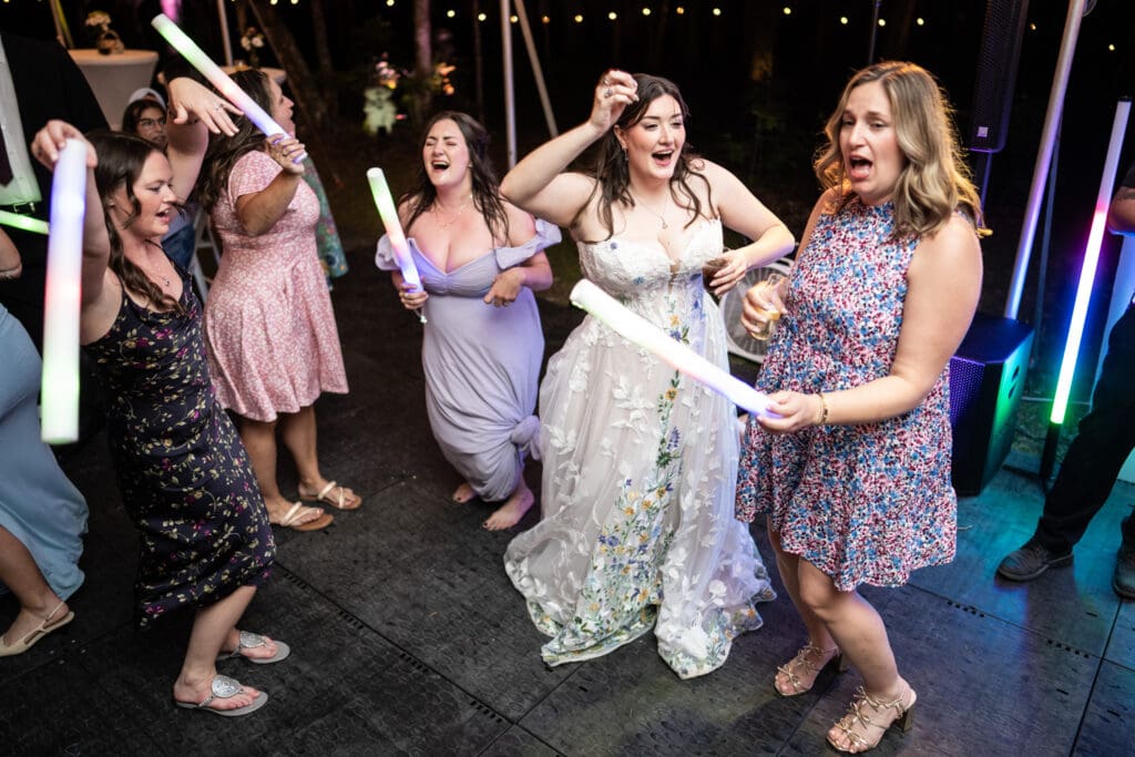 Bride dances with friends