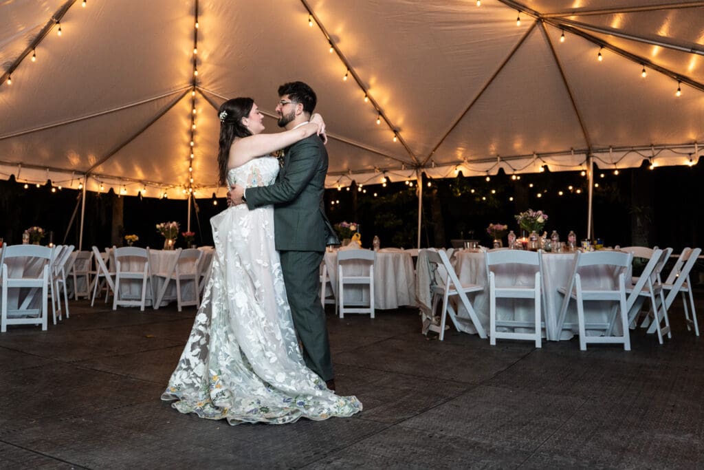 Bride and groom have last dance at end of reception