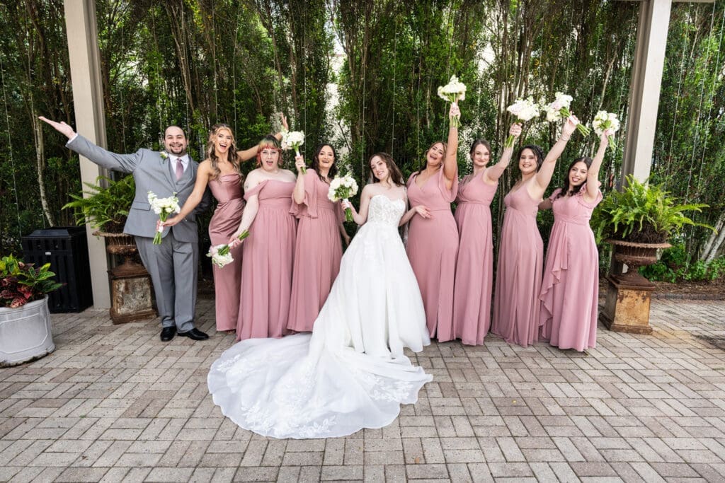 Bride and bridal party celebrate