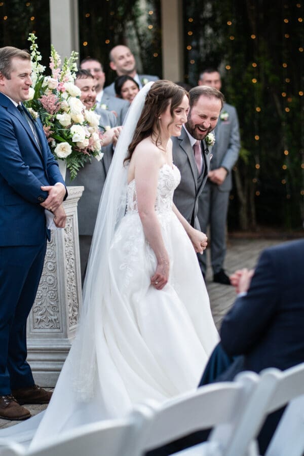 Bride and groom laughing at conclusion of ceremony