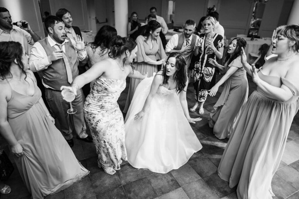 Bride dancing with friends