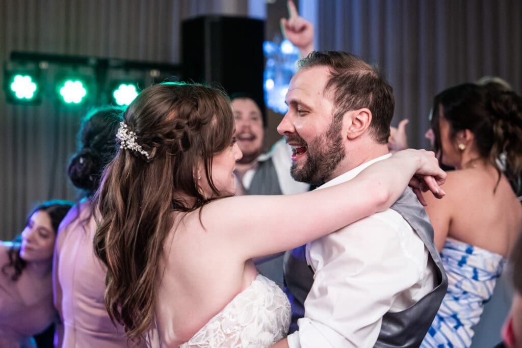 Bride and groom dancing during wedding reception