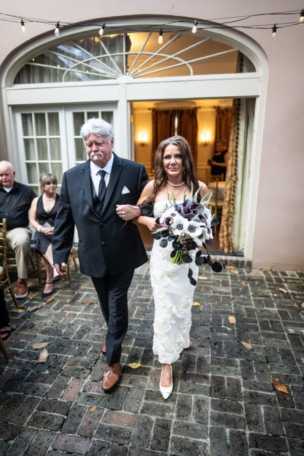 Bride walking up aisle at St. Ann Cottage