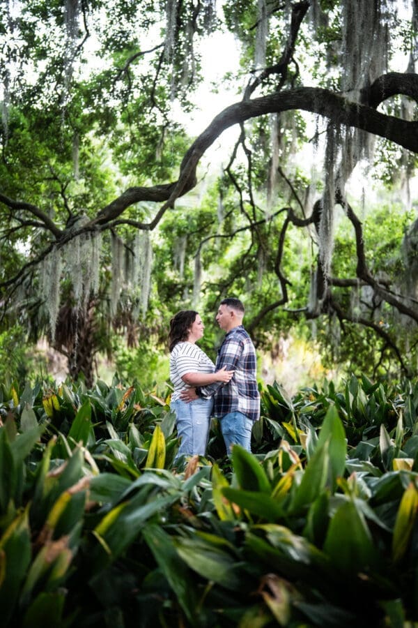 Couple facing each other in park