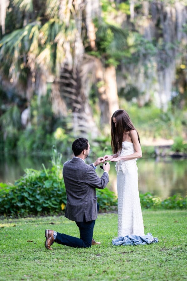 Man proposing to girlfriend in park
