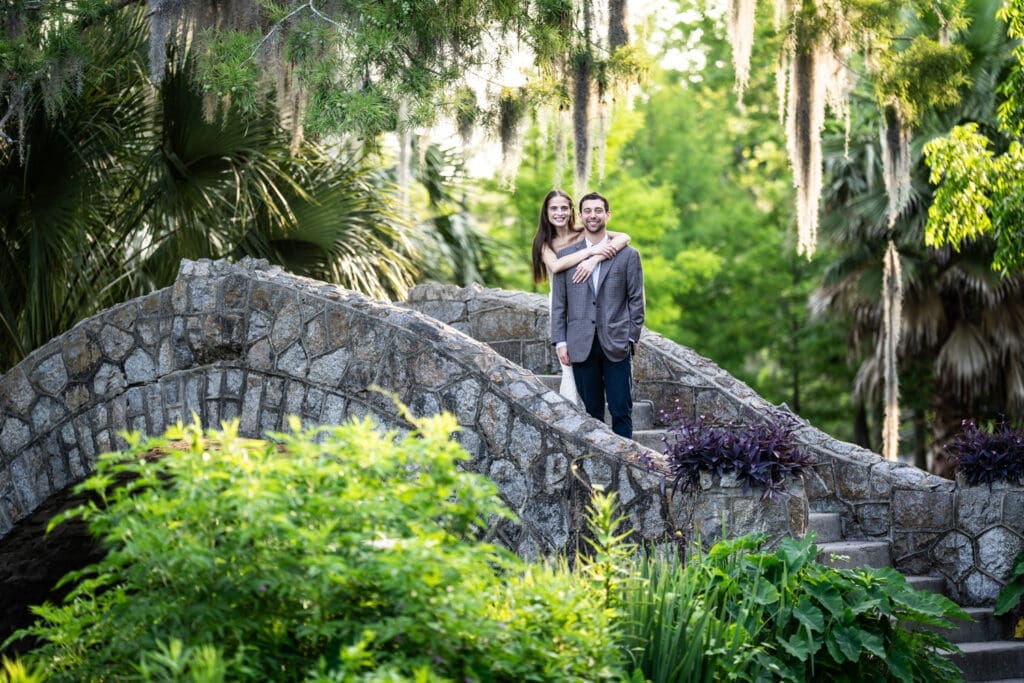Couple on stone bridge in park