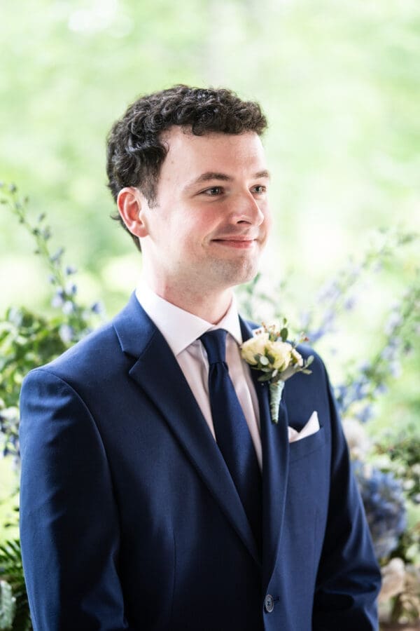 Groom sees bride coming up the aisle