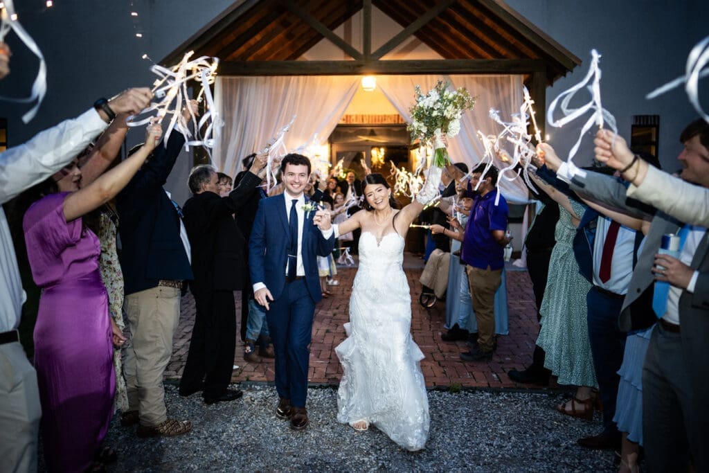 Bride and groom get streamer stick sendoff from Dogwood Venue wedding