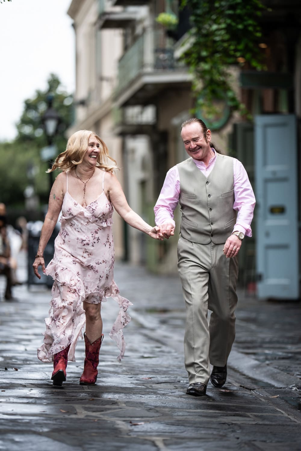 Couple walking through Pirate's Alley