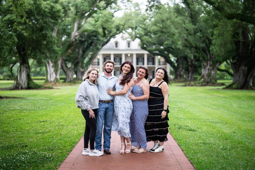 Couple and family members at Oak Alley