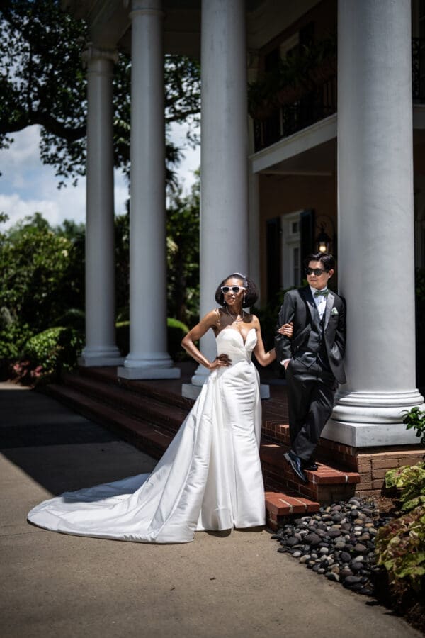 Bride and groom wearing sunglasses
