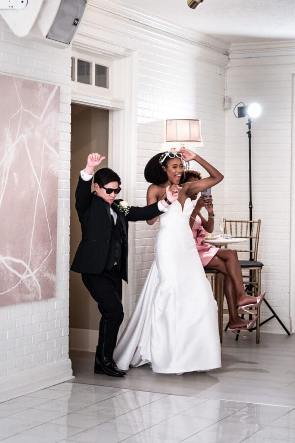 Bride and groom enter the reception