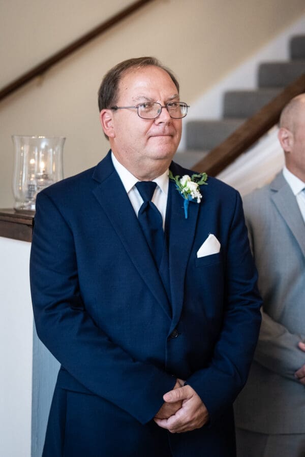 Groom sees bride walking up the aisle