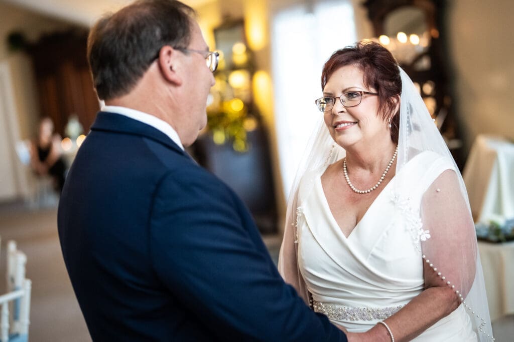 Bride looks at groom