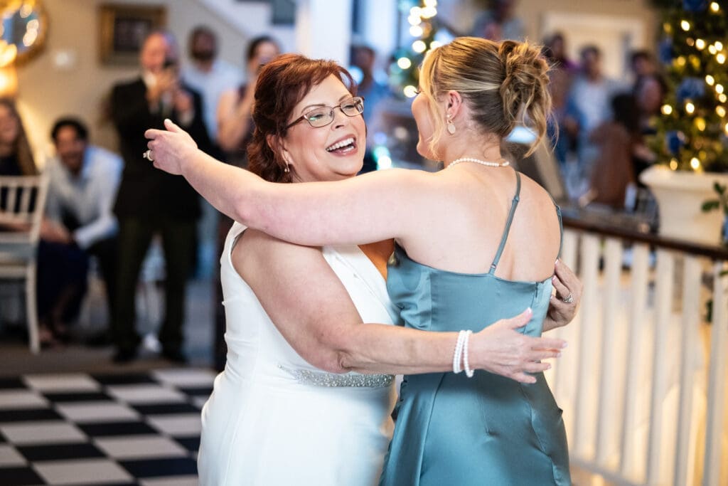 Bride and daughter dance