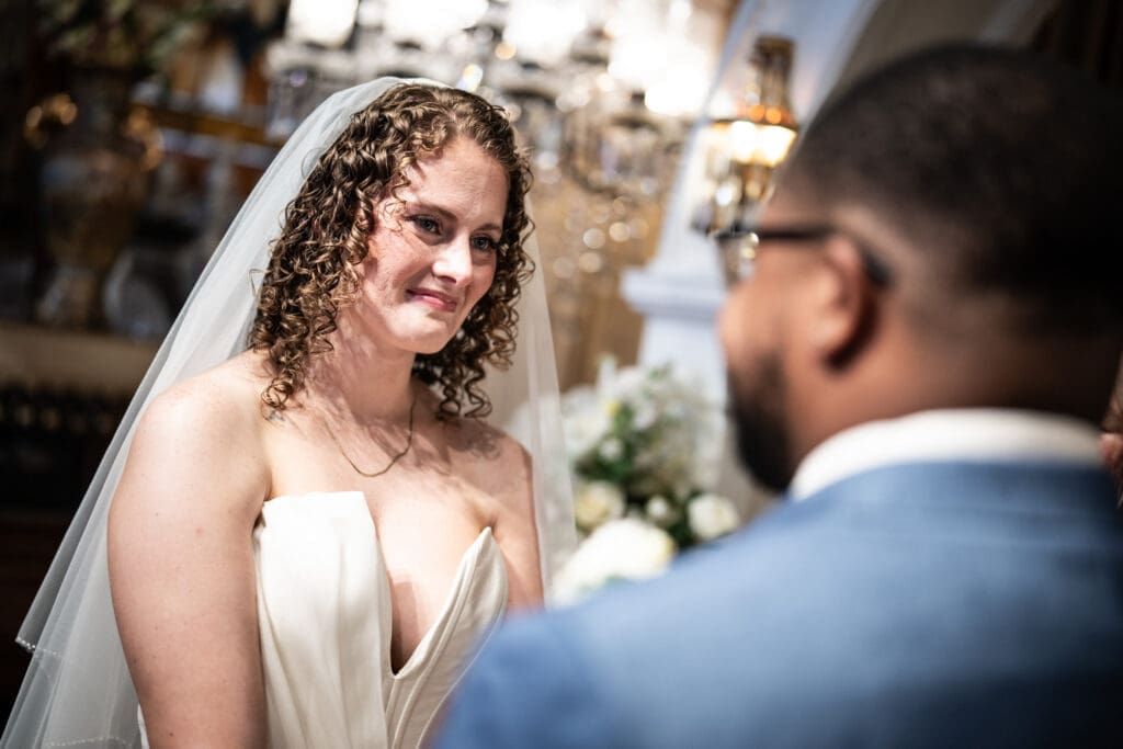 Bride smiles at groom