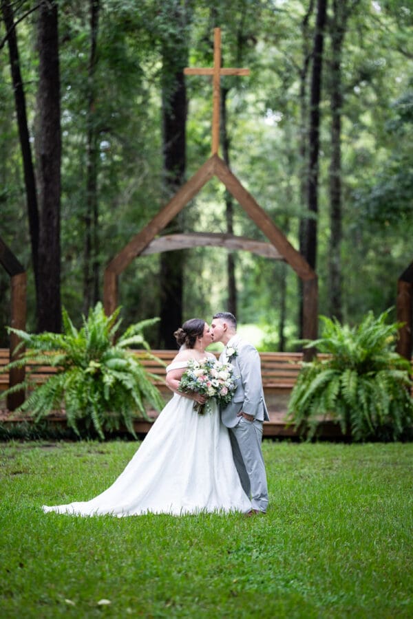 Bride and groom kiss