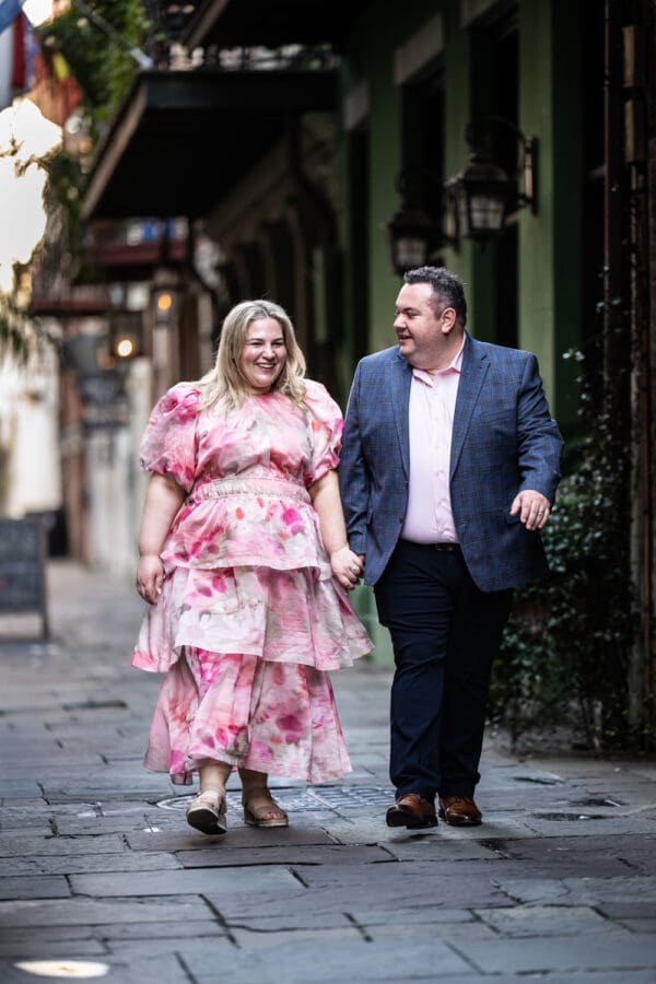Couple walking in the French Quarter holding hands