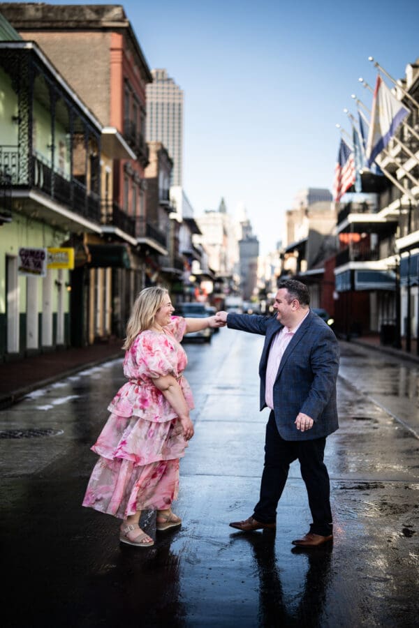 Couple dancing in the middle of Bourbon Street