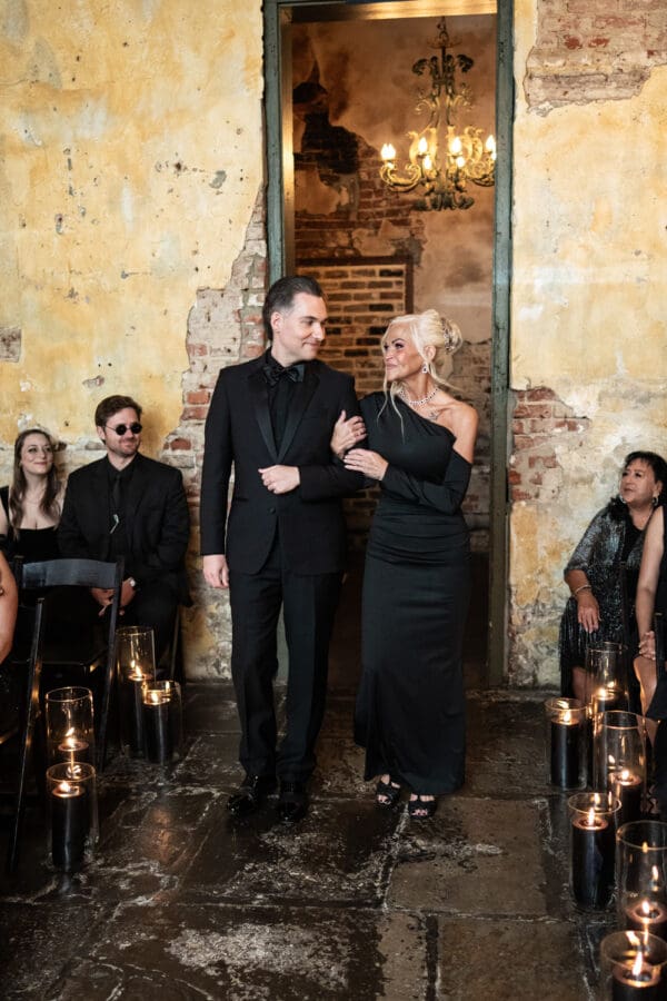 Groom and mom make entrance into ceremony