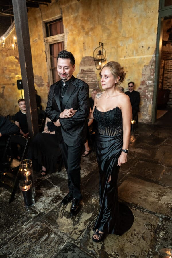 Groom and sister make entrance into ceremony
