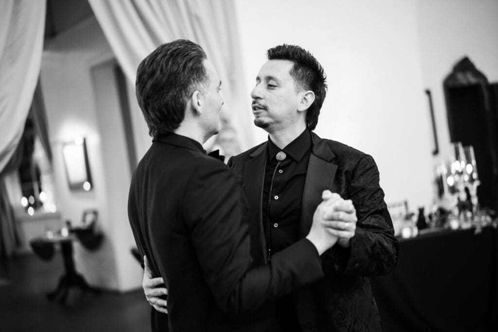 Two grooms have first dance