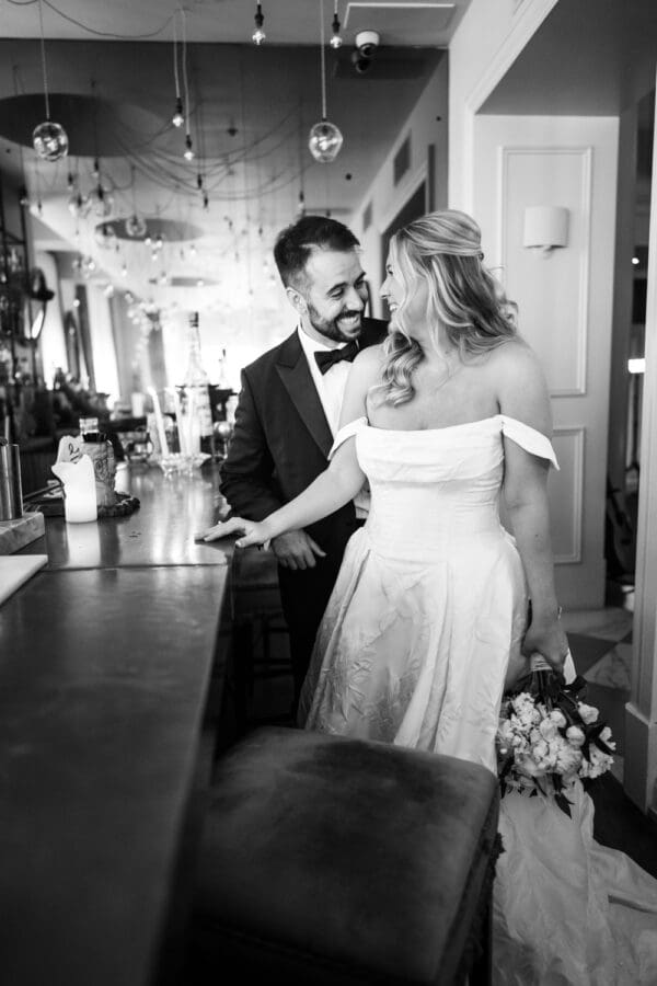 Bride and groom at hotel bar