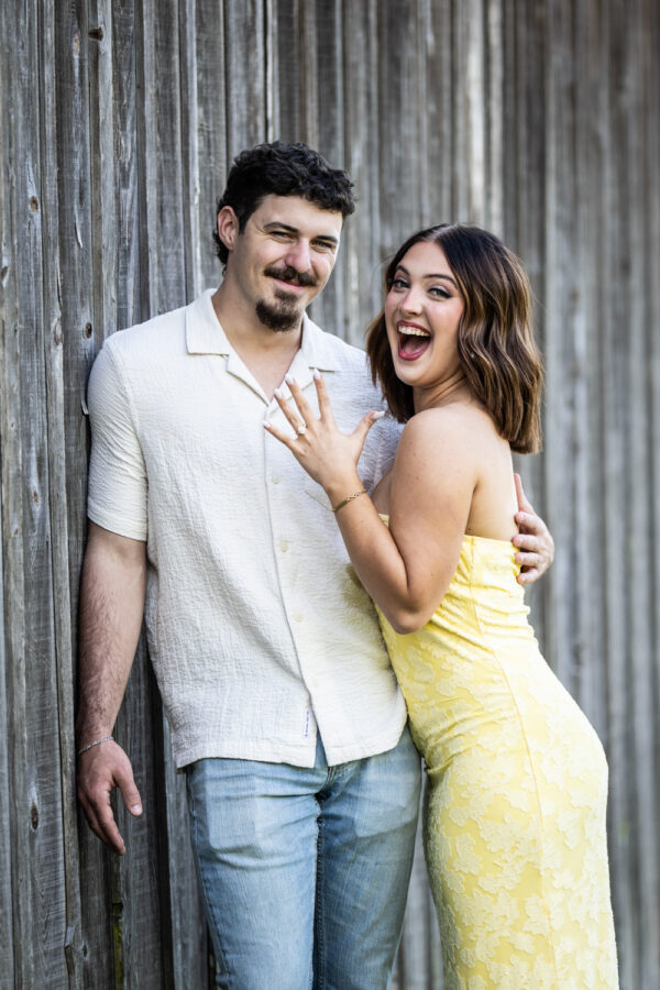 Newly engaged couple shows off the ring