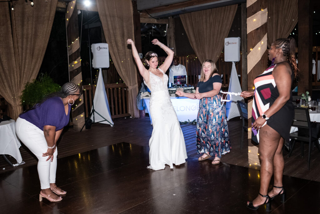 Bride and friends dance